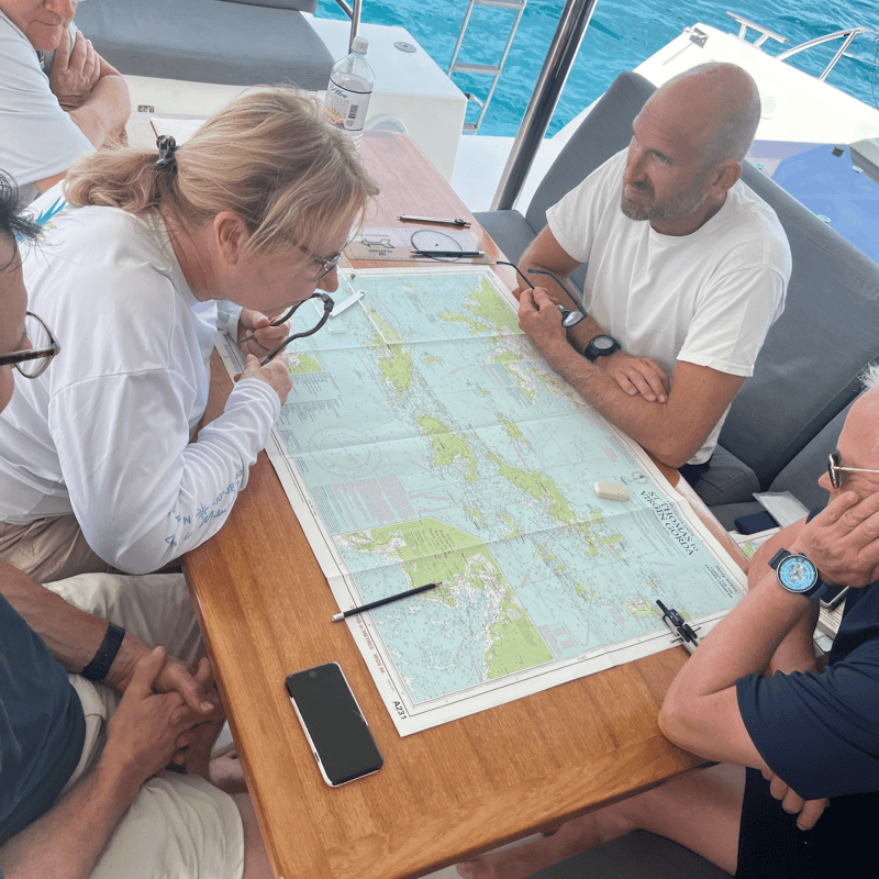 a group of people sitting at a table