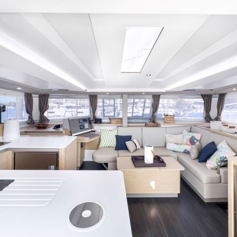 a room filled with furniture and a large window