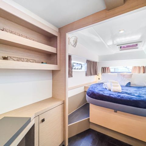 a bedroom with a large window