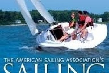 People sailing a small boat on a lake, promoting 'Sailing Made Easy' by the American Sailing Association.