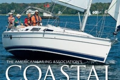 Sailboat with people on water, text: 'Coastal Cruising Made Easy' by American Sailing Association.